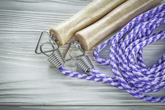 Skipping rope on wooden board Sports training concept