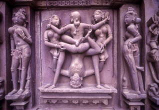 Erotic images on the Exterior wall of the Kandariya Mahadeva temple in Khajuraho, Madhya Pradesh,