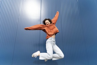 Portrait young woman jumping11