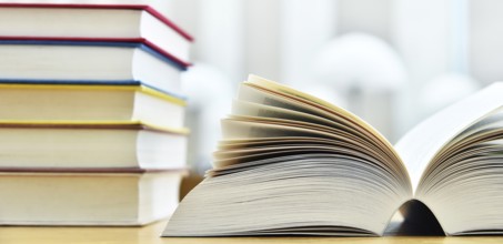 Books lying on the table in the public library