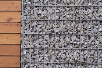 Close-up of stone-wood fence - text free space