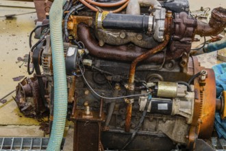 Taean, South Korea. August 14, 2019: Closeup of rusted inboard engine exposed to elements sitting