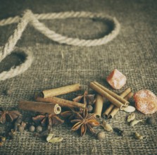Retro Stylized Image Of Spices On The Burlap
