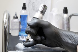 Close up of tattoo artist tools and workplace. High quality photo