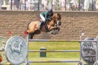 Abdulrahman Alrajhi from Saudi Arabia and riding Heartbeat W, compete in the 1.60m Grand Prix