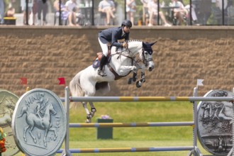 Daniel Bluman of Israel and riding Corbie V.V., compete in the 1.60m Grand Prix during The