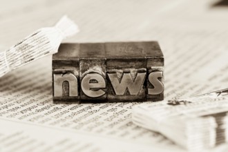 The word News was written in lead letters. Symbol photo for newsletters, newspapers and Information
