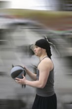 Active motion street basket player ball blur background