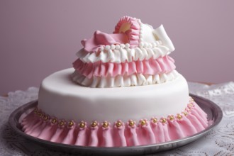 Birthday cake with mastic and little baby in bed
