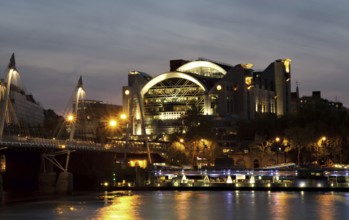 Charing Cross waterfront at dusk and Hungerford Bridge, London, England London, England