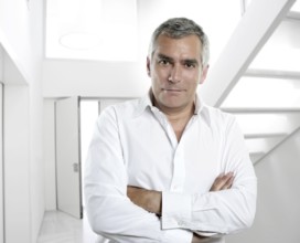 Senior expertise gray hair businessman posing interior white modern office