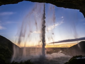 Sunset at Seljalandsfoss waterfall, South Iceland, Iceland, Europe