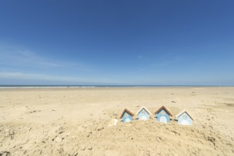 Summer beach with landscape and wooden huts