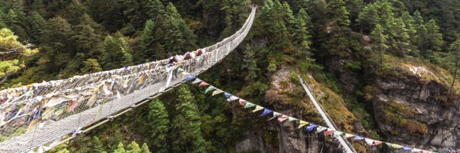 Suspention bridge on the Everest Base Camp Trek, Himalaya mountains, Sagarmatha National Park,