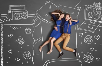 Happy valentines love story concept of a romantic couple lying in bed, sharing headphones, and