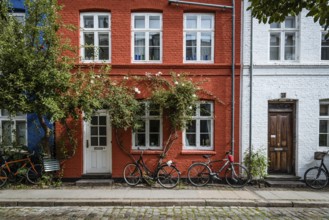 Copenhagen, Denmark, August 12, 2016. Picturesque old brick colorful houses in historical city