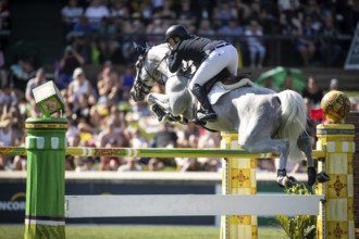 Matthew Sampson of Great Britain and riding Daniel compete in the first round of the 1.60m CPKC