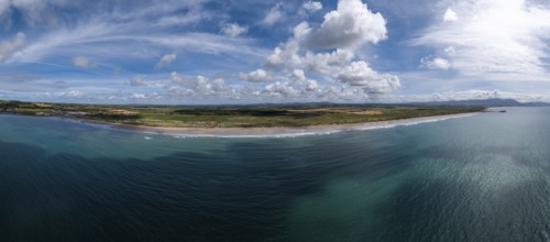 A panorama aerial view of the endless golden sand beach in Ballybunion on the west coast of Ireland
