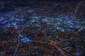 London night view as seen from an airplane. Shooting Location: United Kingdom, London