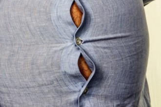 Man with excess weight. Symbolic photo of a beer belly, unsuccessful diets and poor nutrition.