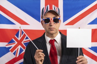 British male businessman with Brexit banner and UK flag