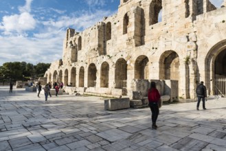 Athens Old Town, Attica, Greece, 12 28 2019 Tourists walking around the theater at the Acropolis,