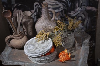Still life with handmade artworks on a wooden studio background
