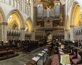 Wells, United Kingdom, 1 September, 2022: view of the Choir and the church organ inside the
