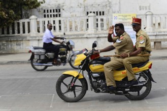 South India, Thanjavur, Madurai, Kovalam, Malabar Coast, Malabar, Kerala, Two policemen on a yellow