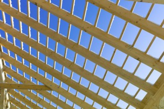 Roof construction made of wood, symbolic photo for home ownership, house construction and house