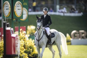 Martin Fuchs of Switzerland and riding Leone Jei compete in the first round of the 1.60m CPKC