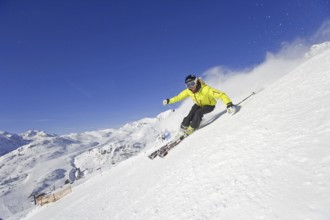 Skier in action, blonde woman, 25, 30, years, downhill skiing, Austria, Europe