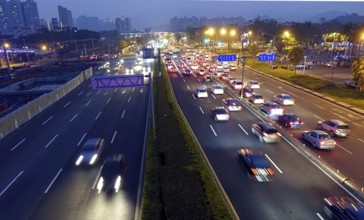 Dense traffic at evening rush hour on a main street in Kaohsiung, Taiwan, Asia