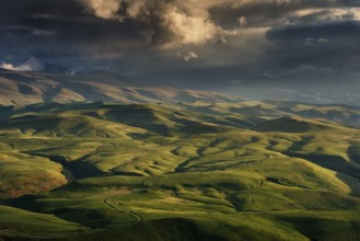 Beautiful landscape with hills in Caucasus mountains at sunset, Russia, Europe