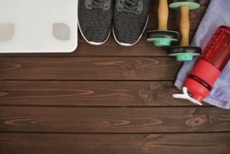 New life, sports paraphernalia on a wooden background, flat concept position