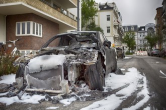 Burnt-out car after another G20 arson attack in 2018