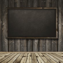 Photo of empty natural wooden interior with blackboard