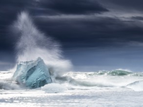Diamond Beach, iceberg in the surf, near Jökulsarlon glacier lagoon, Vatnajökull National Park,