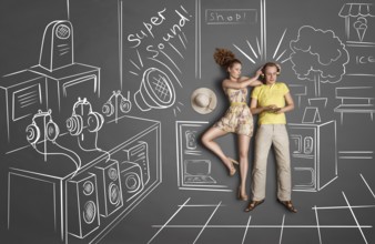 Love story concept of a romantic couple against chalk drawings background. Male listening to the