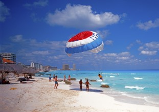 Parasailing on the beach in Cancun, Mexico, Central America