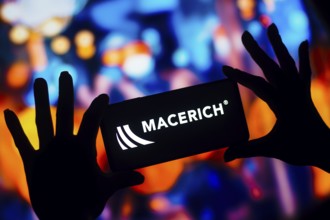 In this photo illustration, the Macerich logo is displayed on a smartphone mobile screen