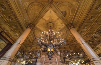 Brussels Old Town, Belgium, 07 18 2018- Decorated interior and roof of Le Metropole, a 5 star