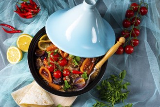 Delicious spicy beef cooked with various vegetables in tagine