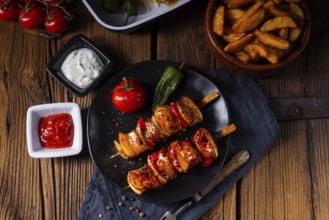 Marinated kebabs with meat and vegetables