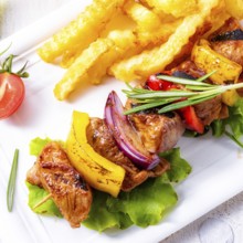 Shish kebab skewers with marinated ham meat paprika and red onion