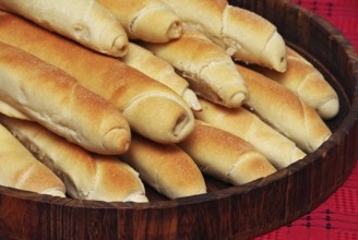 Heap of appetising homemade bread rolled loafs