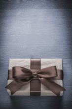 Present box on vintage wood board copy space holiday concept