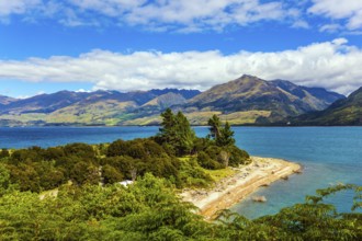The beautiful lake Wanaka in New Zealand. The picturesque shore of Lake Wanaka. South Island.