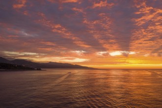 Aerial view of sunrise at Cap Martin, behind the Italian Ligurian coast, Roquebrune Cap Martin,