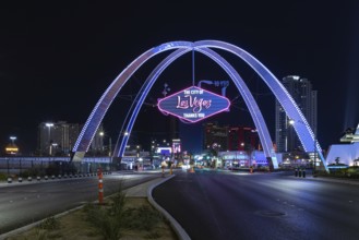 A picture of the Las Vegas Boulevard Gateway Arches at night